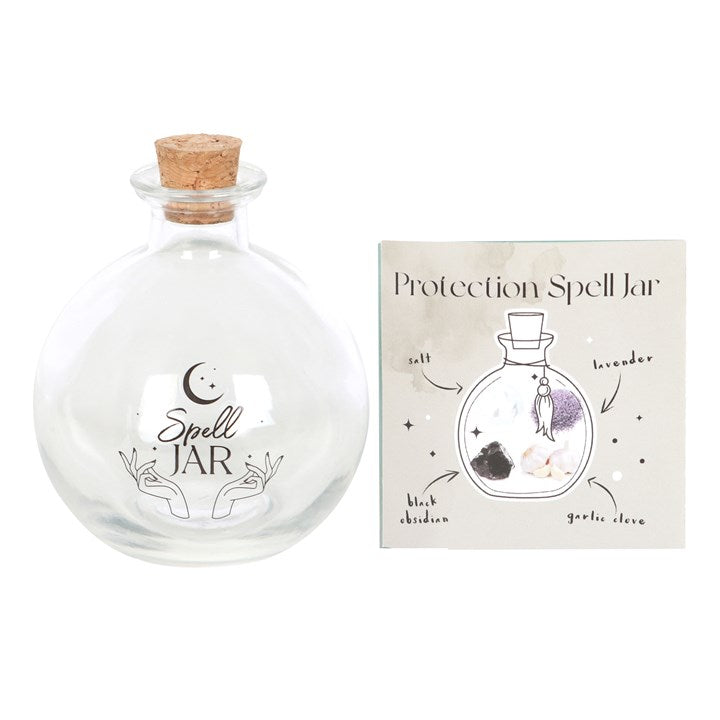 Lasinen loitsupurkki ja ohjekirjanen